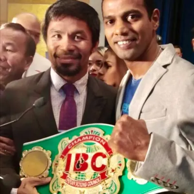 A moment of pride. Standing with the legendary 8-division world champion Manny Pacquiao after becoming the National Title Champion. I bring this world-class experience to my students.