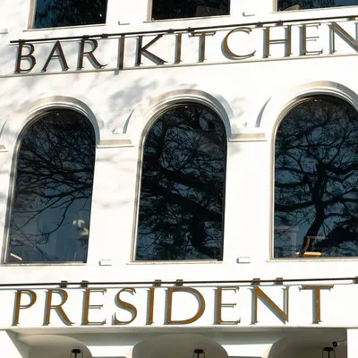 The facade of the President Hotel in Dehradun, an institution since 1976. The redesign of its restaurants honored this legacy, preserving the classic architectural features while introducing a fresh, modern identity.