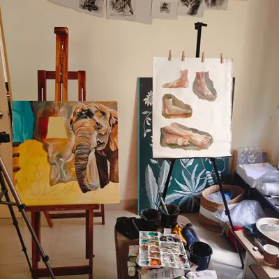 A typical Tuesday morning in my studio. It's a space of purposeful and peaceful oscillation, moving between working on a large canvas and practicing proportions. The mess on the table is a sign of a creative mind at work.