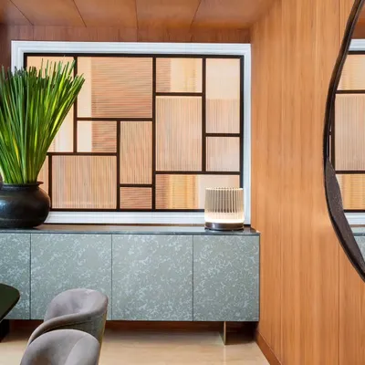 A detail of the Magnolia dining room, showcasing a standout sideboard with unique texture and colour. The space is a curated collection of exceptional design, where every piece is chosen with purpose to create a visually compelling dining experience.