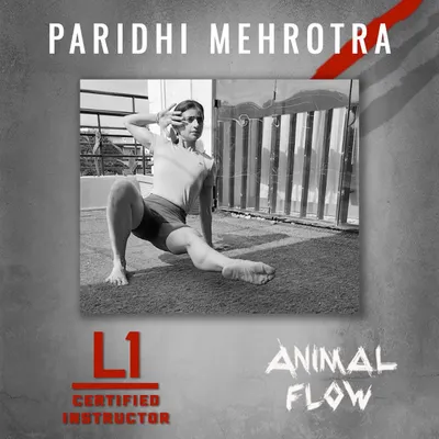 I am a certified Level 1 Animal Flow instructor. This image captures the essence of the practice: a powerful, ground-based movement that builds strength, flexibility, and body control.