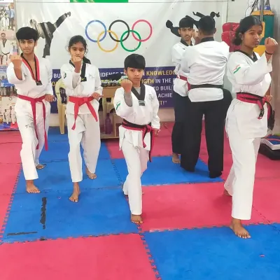 Our students practicing their Poomsae in unison during a black belt test. This demonstrates their synchronization and deep understanding of the forms.