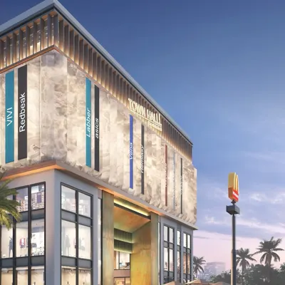 The Town Hall in Siliguri is designed as a landmark for the city's skyline. This exterior view shows the G+5 structure, which integrates vibrant retail, cinemas, restaurants, and office spaces into a single, cohesive destination.
