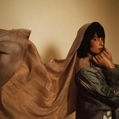 A portrait that captures the beautiful texture and movement of eri silk. This studio shoot for Wandering Silk was about letting the fabric tell its own story, creating a soft and soulful image.