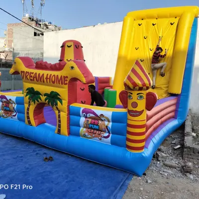 Our 20x20 foot combo bouncy castle includes a large jumping area, multiple obstacles, and a tall inflatable climbing wall. It's a complete activity center for kids.