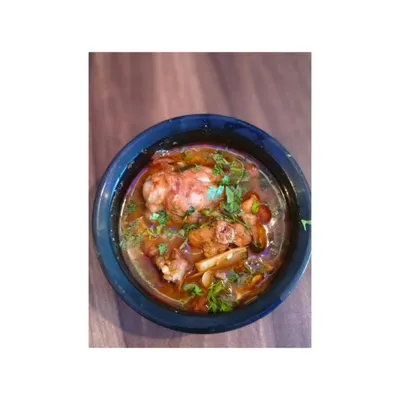 A classic from Nagaland, this is Chicken with Bamboo Shoot. The tender chicken is cooked in a light gravy with the distinct tangy flavour of fermented bamboo shoot.