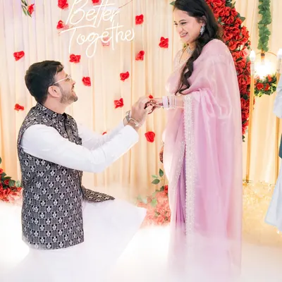 A classic ring exchange moment, made even more special with the dreamy, low-lying fog effect and romantic floral backdrop. We focus on capturing the core memories of your engagement ceremony.