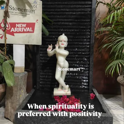 When spirituality is preferred with positivity, I create pieces like this. It features a hand-carved white marble Kanha Ji (Krishna) statue on a 3-foot ribbed granite waterfall.