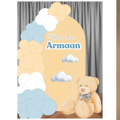 This is a digital mock-up I created for a client's "Welcome Home Armaan" celebration. It shows the proposed layout, colors, and elements like the arched backdrop, balloon garland, and teddy bear.