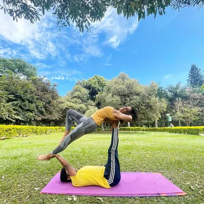A beautiful day for some outdoor acro yoga. This is a therapeutic backbend pose that feels amazing. Practicing in the park is one of my favorite ways to spend a weekend.