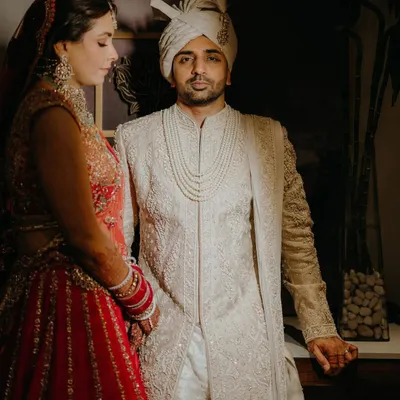 A classic, elegant portrait of the couple in their wedding attire. We focus on creating timeless images that have a formal and regal quality.