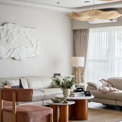 A snapshot of the living room from our Architectural Digest feature. The design combines natural textures like jute and wood with soft, comfortable furniture to create a relaxed yet sophisticated vibe.