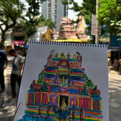 My vibrant sketch of the Ahobilam temple in Chembur, held up against the real thing. I used bold colors to capture the energy of this beautiful place during a sketch walk with USK Mumbai.