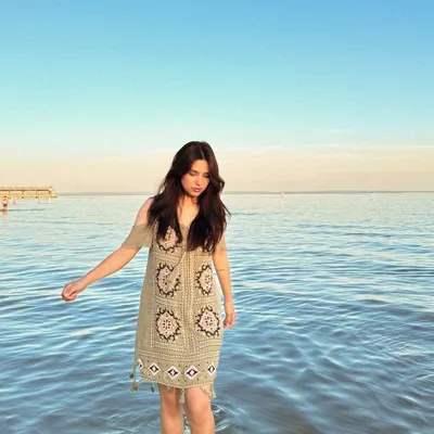 Wading into the water at Crystal Beach in a cute, bohemian-style beach dress.