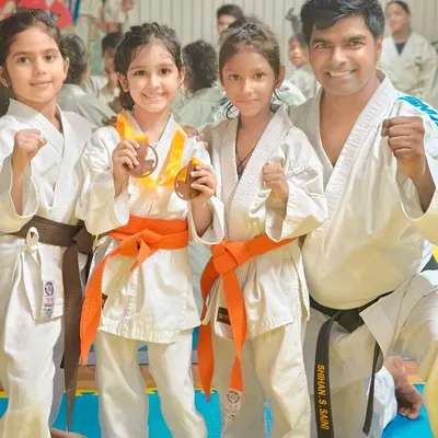 A proud moment with my students after they won medals at a competition. Their smiles are the biggest reward for all the hard work we put in at the academy.