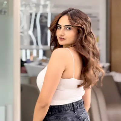A beautiful final look showing a rich caramel balayage. The soft waves really show off the dimension and the seamless blend of colors I created.