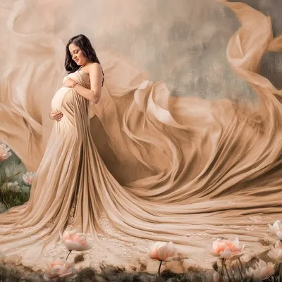 This is what a dream setup looks like. For this fine art maternity portrait, I used flowing fabrics and a digitally enhanced floral landscape to create a truly magical, painting-like memory for this mommy-to-be.