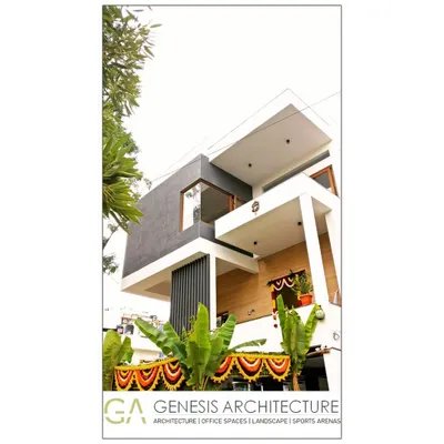 A modern villa in HSR Layout, Bangalore, ready for a housewarming. The design features strong geometric forms, cantilevered balconies, and a mix of textures that create a dynamic and welcoming facade for this family home.