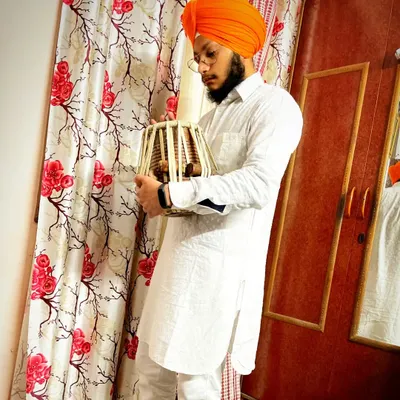 A moment of connection with my bayan, the larger of the two tabla drums. It is responsible for the deep, resonant bass sounds.