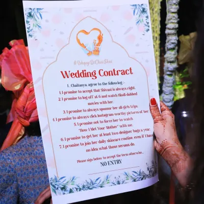This fun and quirky "Wedding Contract" was a huge hit, perfectly capturing the couple's playful dynamic and adding a unique, personal touch to their celebration.