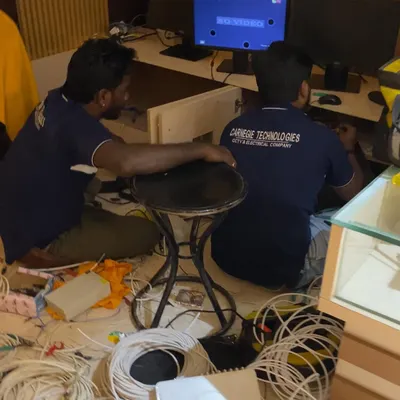 Our team is at work on a complex wiring job for a commercial client. We handle everything from running cables to configuring the system, ensuring a robust and reliable security network.