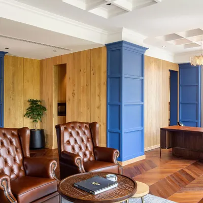 We believe in creating bespoke furniture that embodies quality and sophistication. This private office features custom wood paneling and classic leather armchairs, showcasing our ability to craft pieces that are both luxurious and timeless.