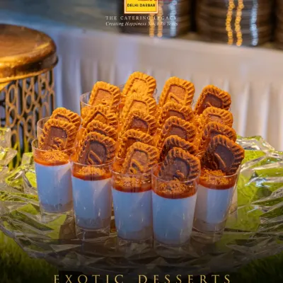Exotic desserts that don't just end a meal, they define it. Our Lotus Biscoff dessert cups are a modern favorite, layering creamy mousse with the iconic spiced cookie.