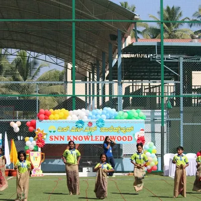 Hosting the annual sports day for SNN Knowledge Wood school. Here, students participate in a classic sack race on our spacious and safe football turf.