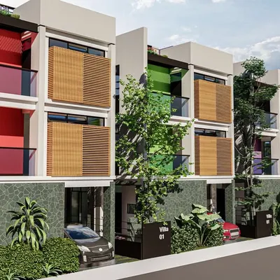 This elevation design for a row of modern villas uses a unique color for each unit's balcony, giving each home a distinct identity while maintaining a cohesive contemporary aesthetic.