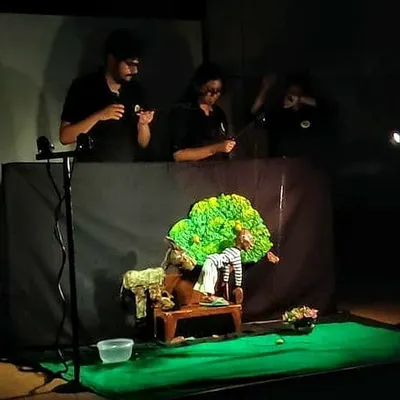 Our team performing a show with a fully detailed stage set, complete with trees and furniture. These back-to-back shows at Auden school were a fun day for everyone involved.