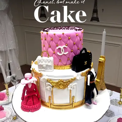 Chanel, but make it cake. This two-tier creation features the classic quilted pattern in pink, the iconic logo, and handcrafted sugar figurines, perfect for a high-fashion celebration in Paris.