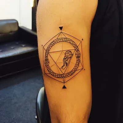 A geometric Ouroboros, the ancient symbol of a snake eating its own tail. This design represents infinity and the cycle of life, death, and rebirth, all within a clean hexagonal frame.