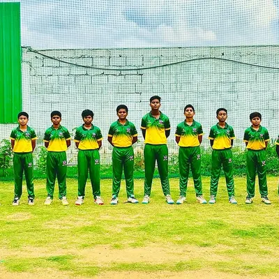 A full lineup of one of our youth cricket teams, ready for action. We focus on building a strong, cohesive unit where every player supports each other on and off the field.