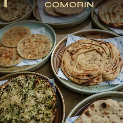 Round, flaky, crisp, charred. The breads of Comorin come in every mood and texture, from lachha paratha to garlic naan and simple rotis.