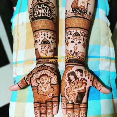 A classic baby shower design celebrating the parents-to-be. This mehandi features a portrait of the couple, a Ganesha motif for blessings, and baby-themed elements like a pram and hanging toys.