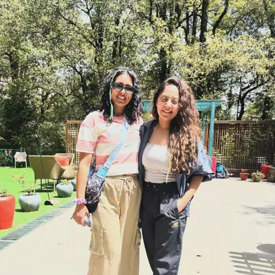 Two members of our tribe enjoying the serene atmosphere at our Nainital jungle resort. It's a chance to disconnect from daily life and reconnect with yourself and like-minded people.