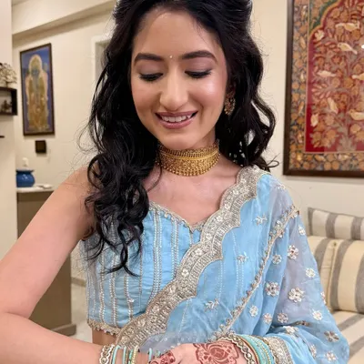 A dreamy glow for her Roka ceremony. I used subtle eye makeup and a natural flush on the cheeks to create a look of timeless elegance that perfectly complements her pastel blue saree.