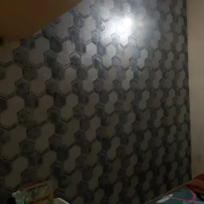 A 3D hexagonal tile wallpaper. The shading on this design creates a convincing optical illusion of depth.