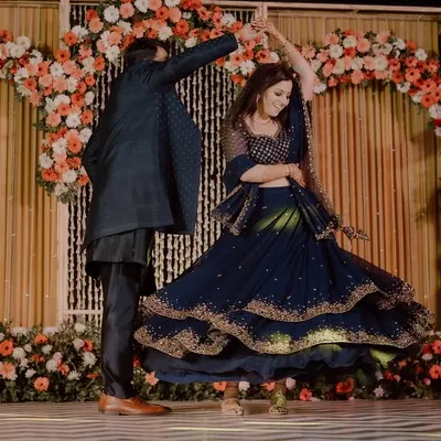 A perfect twirl during the couple's sangeet performance. We focus on creating these picture-perfect moments that you'll cherish forever.