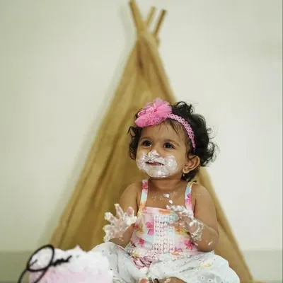 Look at this adorable cake smash. It's pure joy seeing a little one have so much fun with a cake I made.