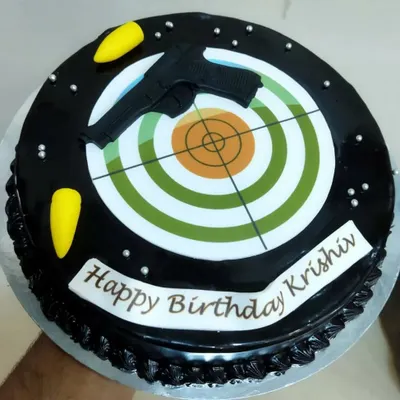 A birthday party with us comes with special touches. This close-up shows a custom-designed chocolate cake with a shooting target theme, which was the highlight of a recent kid's birthday party at our Mumbai range.