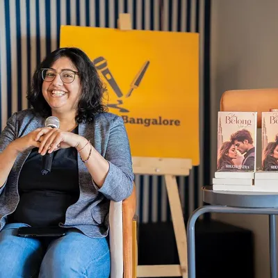 Author Shuchi Batra smiling during the launch of her book "You Belong with Me". We love creating these opportunities for authors to connect with the Bangalore literary community.