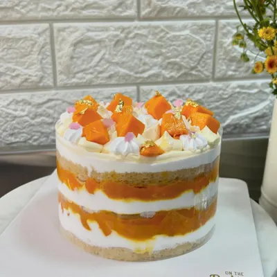 Mango madness is here! My Mango Tango cake features layers of moist vanilla sponge, fresh Alphonso mango pulp, Chantilly cream, and fresh mango pieces. It's a taste of sunshine!