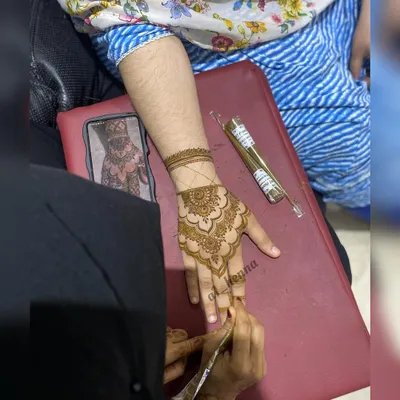 Watch as I guide a student's hand. My in-person classes allow for direct, personalized feedback to help you perfect your cone handling and pressure control.