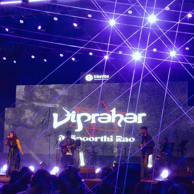 Our band, Viprahar, live on stage at AFMC Pune under a spectacular laser light show. This is the kind of large scale production we bring to our festival performances.