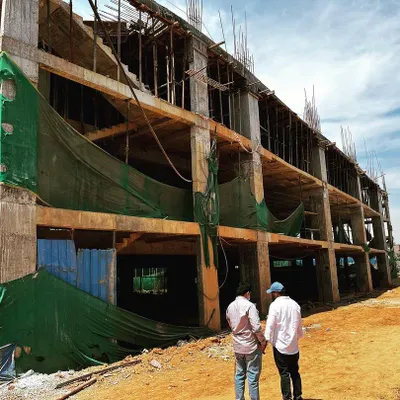 A site visit to one of our commercial projects during the construction phase. This stage is crucial for ensuring the structural integrity and precise execution of our architectural plans.