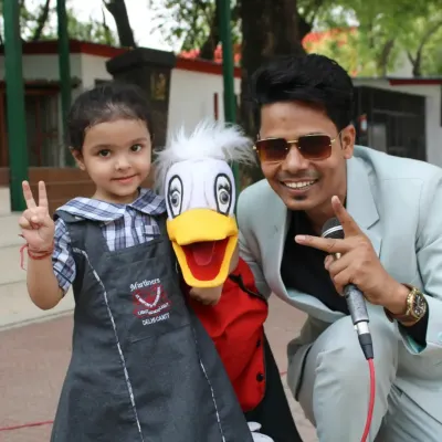 A happy moment with a student and Ducky after a school show. We aim to be approachable and friendly, making the experience memorable for the kids.