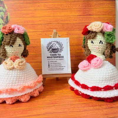 Here are two of my reversible rose bucket dolls side-by-side, showing how different color combinations can create a unique personality for each one. They are designed to be a doll on one side and a flower bucket on the other.