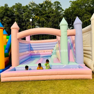 Our beautiful Pastel Paradise Castle, featuring a slide and a ball pit in soft shades of pink, purple, and mint. It's the perfect dreamy addition to any little one's party.