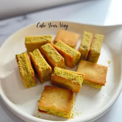 This is my Nankhatai Pistachio "Ice Cream" Sandwich. I take two chewy Nankhatai-style cookies and sandwich them with a creamy, nutty pistachio filling for a truly unique fusion dessert.